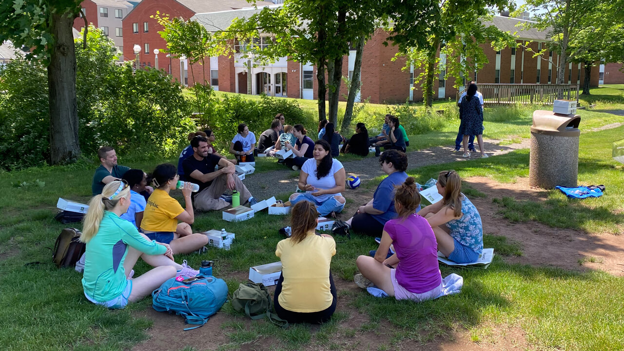 QUIP-RS students gather on the Mount Carmel campus for a meeting.