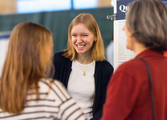 Kaylee Pettengill discussing her research at the Exploratorium